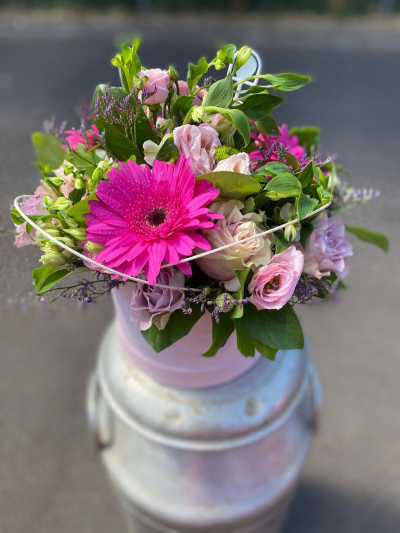 Raspberry Ripple Hat Box - A playful pink arrangement combining vivid cerise tones with softer pinks, fresh greens and delicate lilac touches.