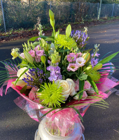 The Grand Affair - An abundant statement bouquet in elegant pinks, purples and fresh greens, beautifully arranged for an impressive finish.